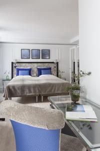 Postel nebo postele na pokoji v ubytování Absalon Hotel