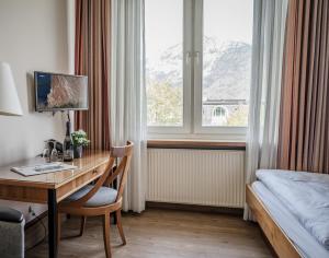 Postel nebo postele na pokoji v ubytování Alpenstadthotels
