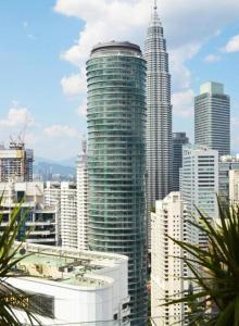 a view of a city with tall buildings at Vortex Suite & Residence Kuala Lumpur in Kuala Lumpur