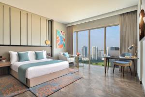 Posezení v ubytování Citadines Paras Square Gurugram