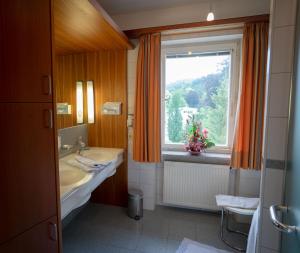 Koupelna v ubytování Alpenstadthotels