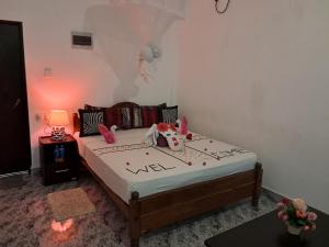 Postel nebo postele na pokoji v ubytování Dream Villa Sigiriya