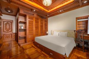 Postel nebo postele na pokoji v ubytování Monalisa Luxury Hotel