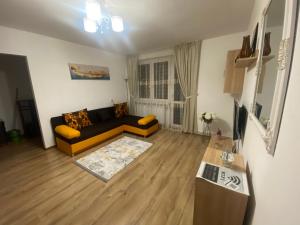 Posezení v ubytování Apartament Dinu Toplita