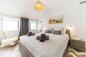 Postel nebo postele na pokoji v ubytování Apartment Mo-Mo + 29 fotografií