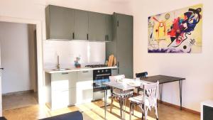 Virtuvė arba virtuvėlė apgyvendinimo įstaigoje Oasi Urbana: Confort e Stile