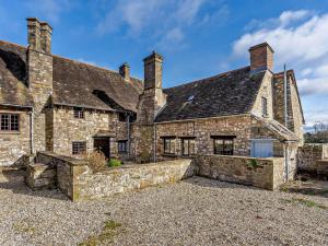 an old stone building with a stone wall at 2 Bed in Llanover 91242 in Abergavenny