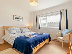 Ένα ή περισσότερα κρεβάτια σε δωμάτιο στο 3 Bed in Newton Ferrers 90945