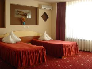 Postel nebo postele na pokoji v ubytování Hotel Kleyn