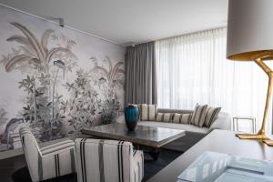 Postel nebo postele na pokoji v ubytování Hotel Topazz & Lamée
