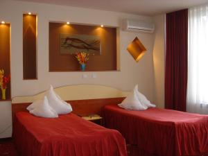 Postel nebo postele na pokoji v ubytování Hotel Kleyn