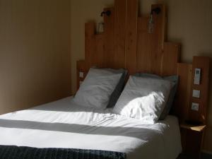 Postel nebo postele na pokoji v ubytování Chambre nature