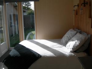 Postel nebo postele na pokoji v ubytování Chambre nature