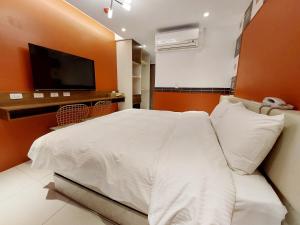 TV a/nebo společenská místnost v ubytování 安平商旅Choona Hotel Anping