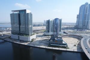 Fotografie z fotogalerie ubytování Brown Stone - Canal & Skyline View Voleo v Dubaji