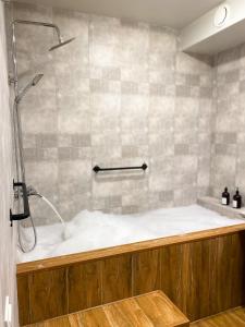Koupelna v ubytování HERBS & HONEY boutique hotel & restaurant