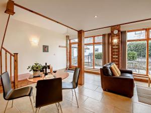 a living room with a table and chairs at 1 Bed in Mattersey 91308 in Mattersey