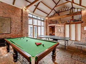 a large room with a pool table in it at 3 Bed in Mattersey 91307 in Mattersey