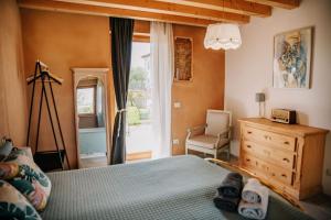 Posteľ alebo postele v izbe v ubytovaní Country apartment, near Bardolino and Lazise