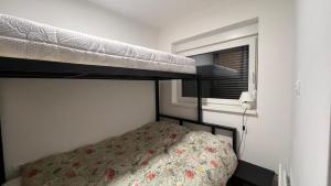 En eller flere senge i et værelse på Apartment Bjelašnica 8