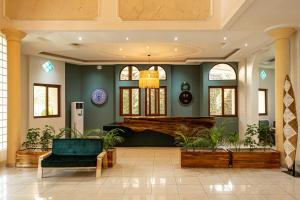 Posezení v ubytování Tamarin Hôtel Cotonou + 37 fotografií