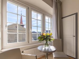 Posezení v ubytování Hôtel de la Rose
