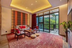 Posezení v ubytování Shenzhen OCT Gankeng Ancient Town Phoenix Hakka Hotel