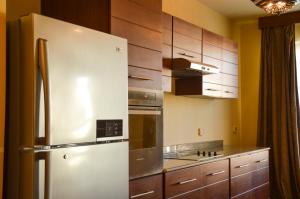 A kitchen or kitchenette at Marina Residence Suites Port Ghalib