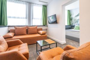 TV a/nebo společenská místnost v ubytování City Joy - sports Center Tasmajdan
