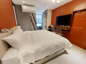 TV a/nebo společenská místnost v ubytování 安平商旅Choona Hotel Anping