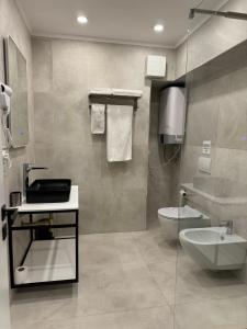 Koupelna v ubytování L’Hotel Tirana