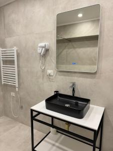 Koupelna v ubytování L’Hotel Tirana