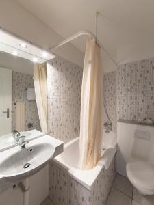 Koupelna v ubytování Hôtel de la Rose