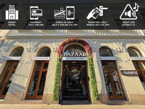 a building with the entrance to a shopping center at Bazaar Boutique Residence in Budapest