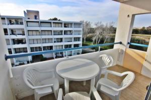 En balkon eller terrasse på Pé do Lago Apartment - Condominium - Pool