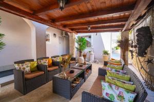 Posedenie v ubytovaní Apartments Villa Aura - Adult Only