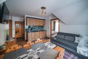 Posedenie v ubytovaní Willa Pasieka Apartamenty Domki