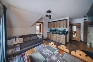 Posedenie v ubytovaní Willa Pasieka Apartamenty Domki
