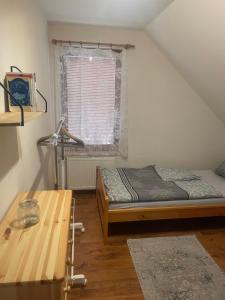 Posteľ alebo postele v izbe v ubytovaní Apartmán Beruška