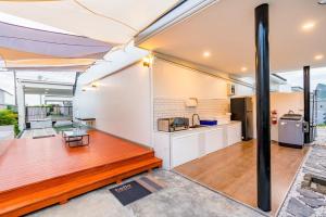 an open kitchen and dining area of a house at 58/20 Pool Villa in Cha Am