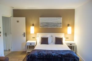 Cama o camas de una habitación en Osabarena Hotela