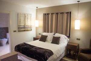 Cama o camas de una habitación en Osabarena Hotela