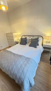 Cama o camas de una habitación en Glenmore Suites