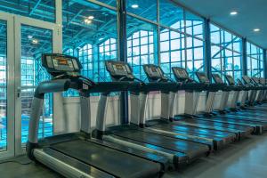 a row of treadmills in a gym at City Joy - sports Center Tasmajdan in Belgrade