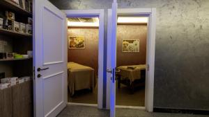 an open door leading to a room with a table at Mai İnci Otel in Antalya