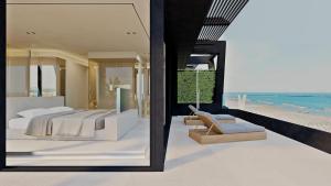 a bedroom with two beds and a view of the beach at Victoria Palace Hotel in Cattolica