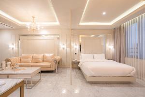 En eller flere senge i et værelse på H-AVENUE HOTEL Yeongdeungpo