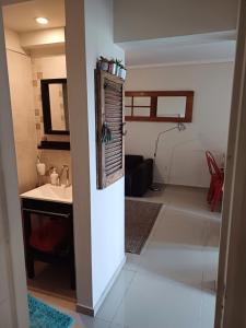 a small bathroom with a sink and a sink at Dpto doña coca alto villasol gama in Córdoba