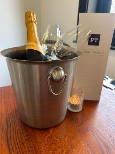 a bucket with a bottle of champagne and a box at The Fishmongers Tavern in Sheringham