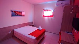 Posteľ alebo postele v izbe v ubytovaní Pousada Tianguá